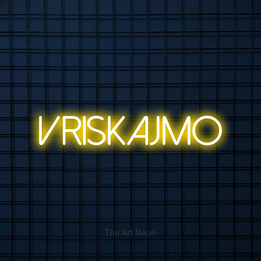 LED neon sign reading “VRISKAJMO”, arranged in a single line.