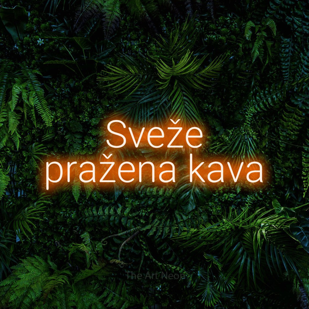 LED neon sign reading “Sveže pražena kava”, arranged in two lines.