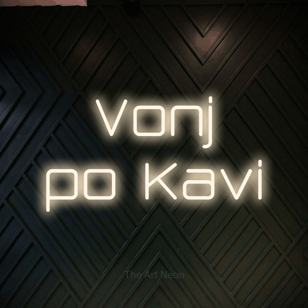LED neon sign reading “Vonj po Kavi”, arranged in two lines.