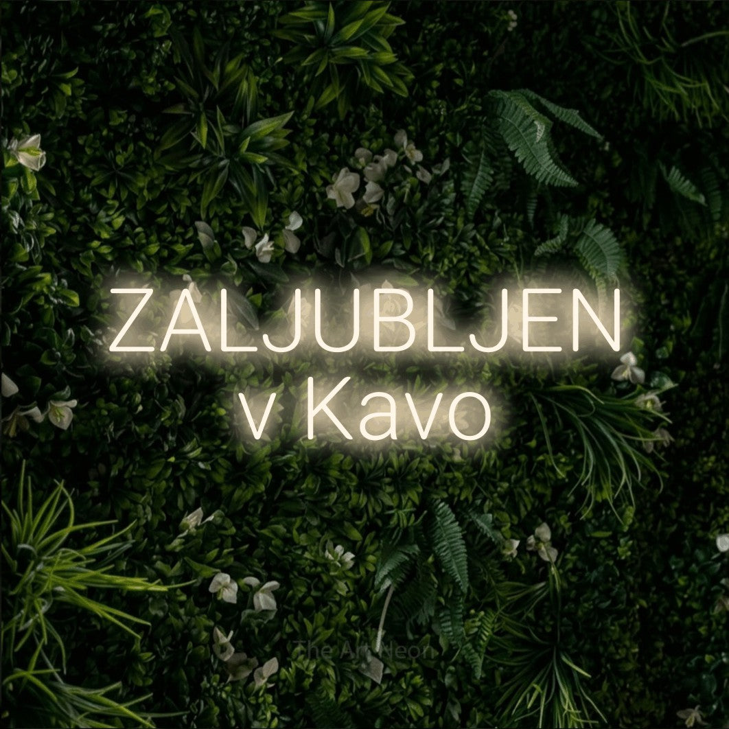 LED neon sign reading “ZALJUBLJEN v Kavo”, arranged in two lines.