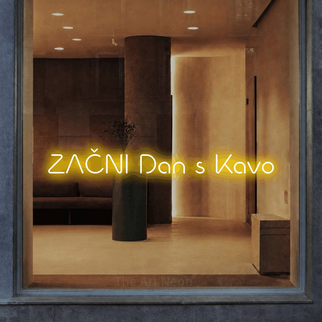 LED neon sign reading “ZAČNI Dan s Kavo”, arranged in a single line.