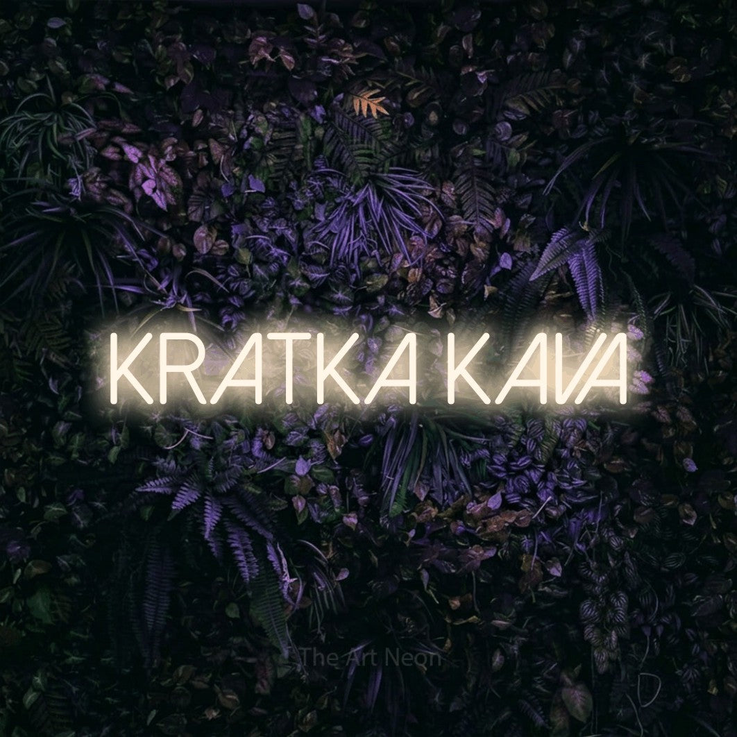 LED neon sign reading “Kratka Kava”, arranged in a single line.