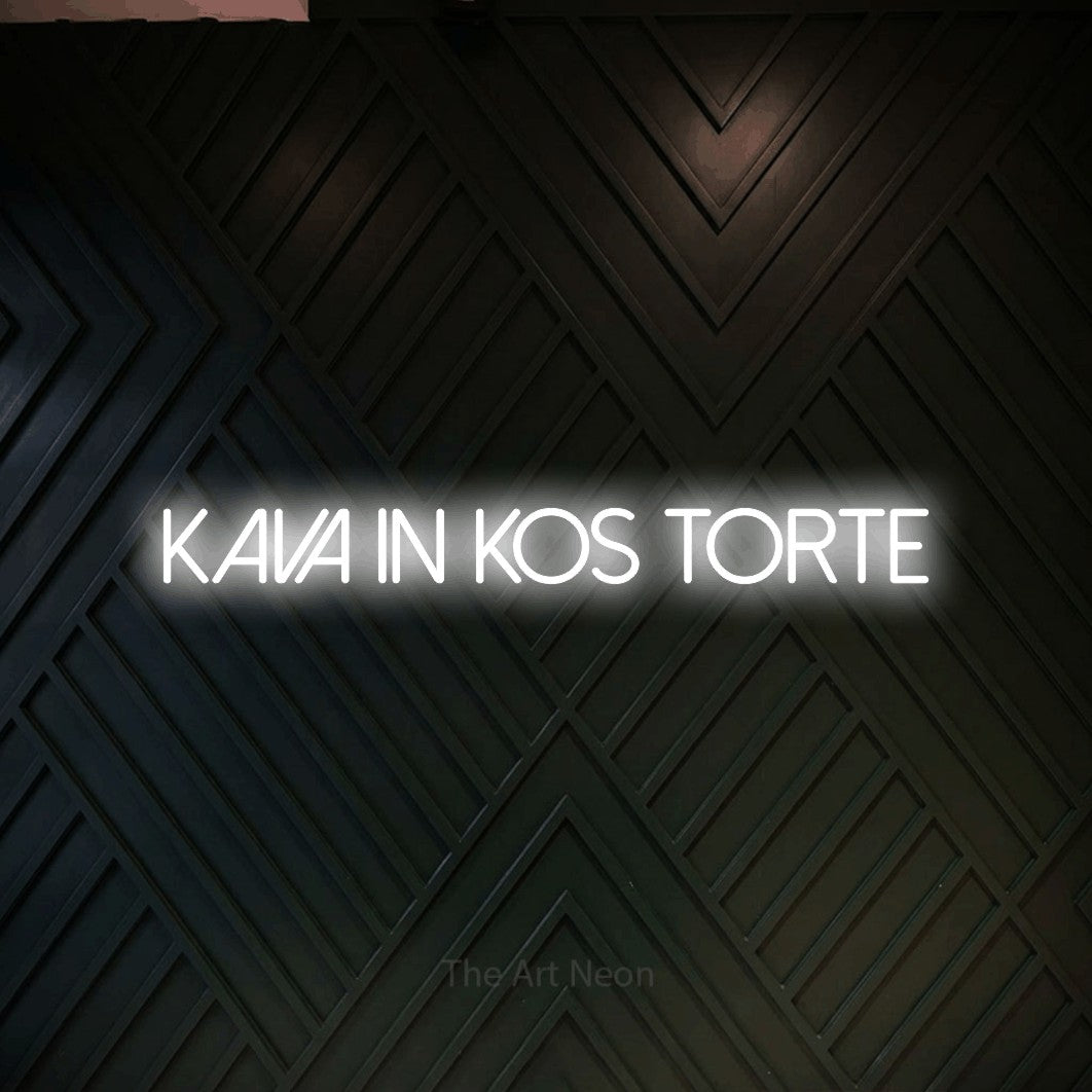 LED neon sign reading “Kava in Kos Torte”, arranged in a single line.