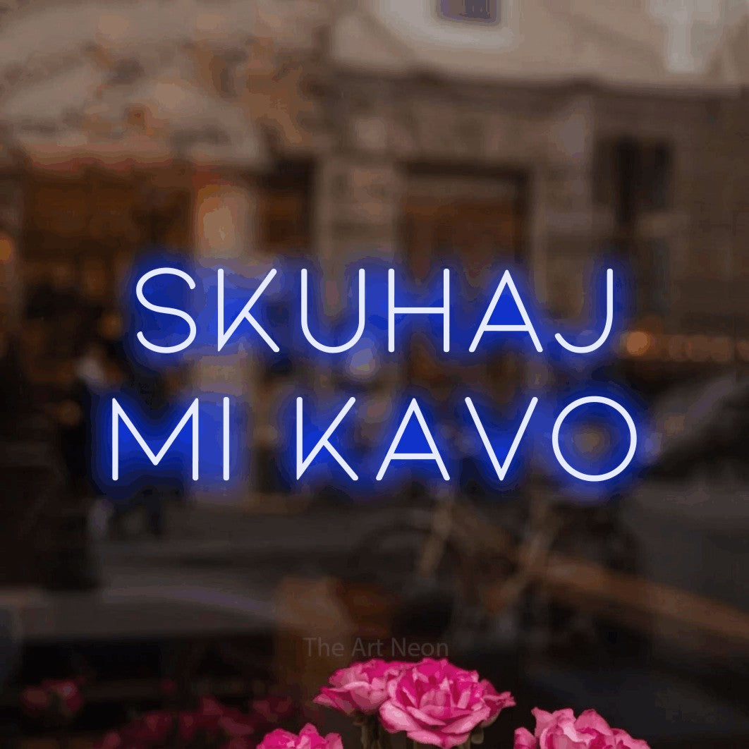 LED neon sign reading “skuhaj mi kavo”, arranged in two lines.
