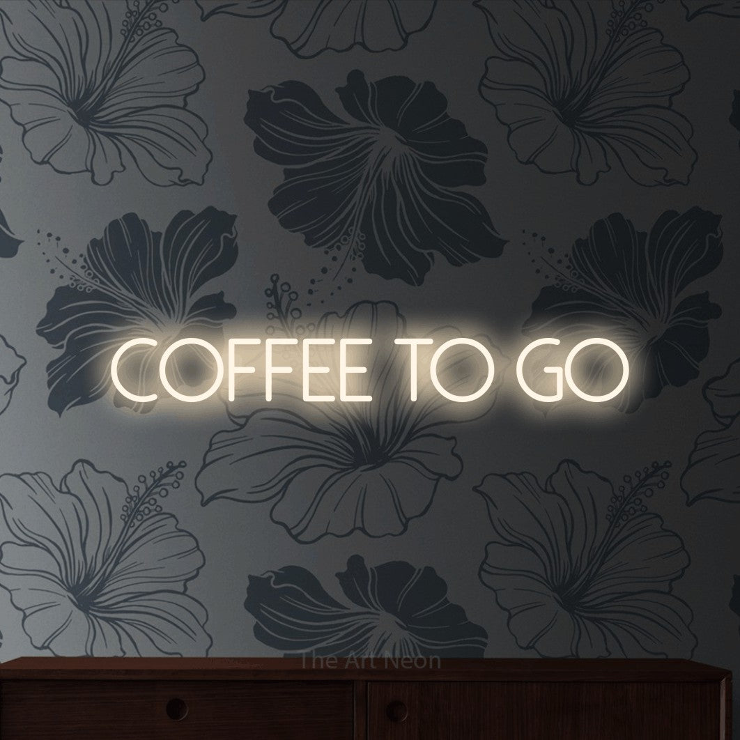 LED neon sign reading “coffee to go”, arranged in a single line.
