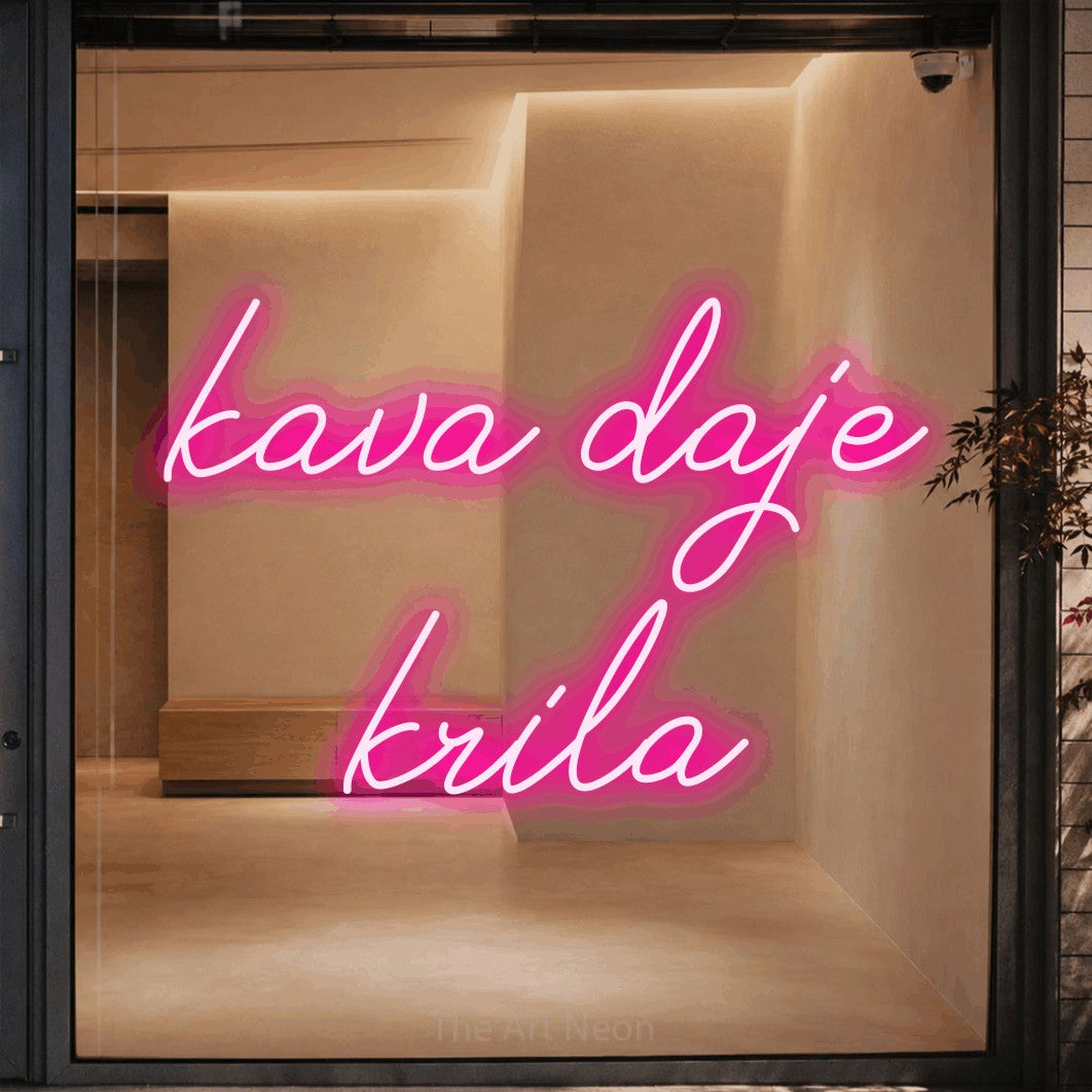 LED neon sign reading “kava daje krila”, arranged in two lines.