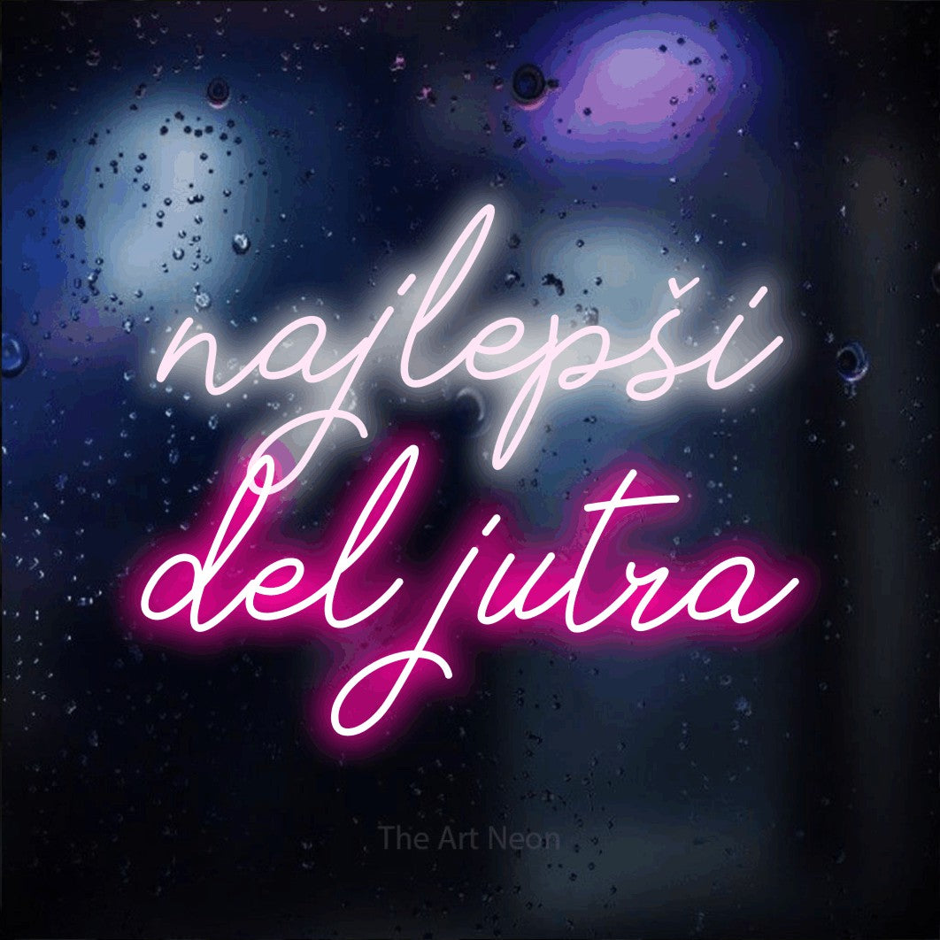 LED neon sign reading “najlepši del jutra”, arranged in two lines.