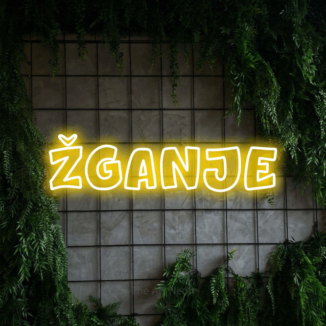 LED neon sign reading “žganje”, arranged in a single line.
