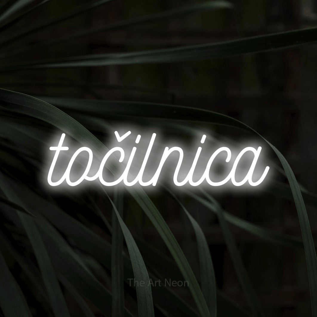 LED neon sign reading “točilnica”, arranged in a single line.