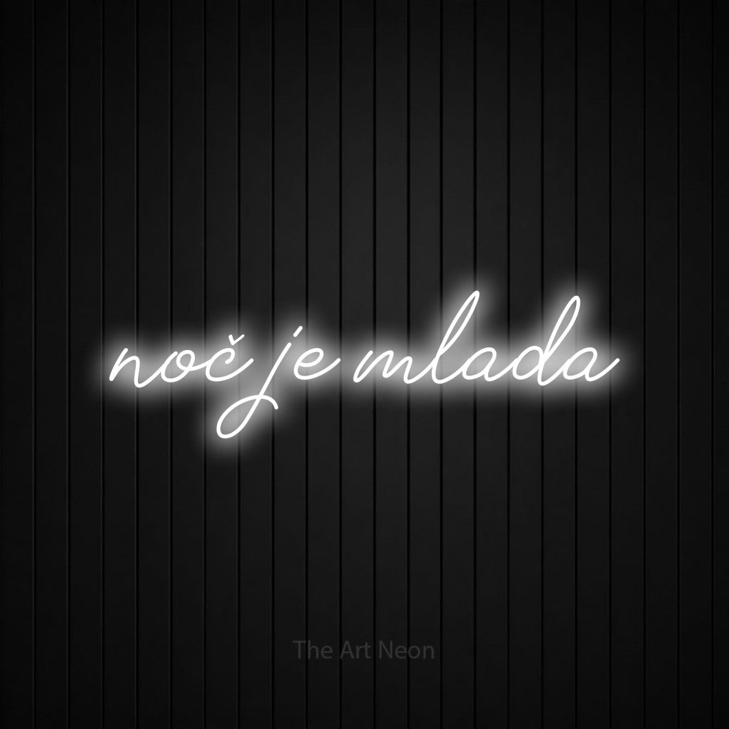LED neon sign reading “noč je mlada”, arranged in a single line.