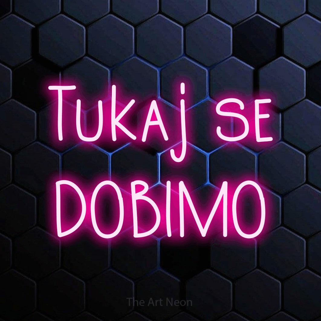 LED neon sign reading “Tukaj se DOBIMO”, arranged in two lines.