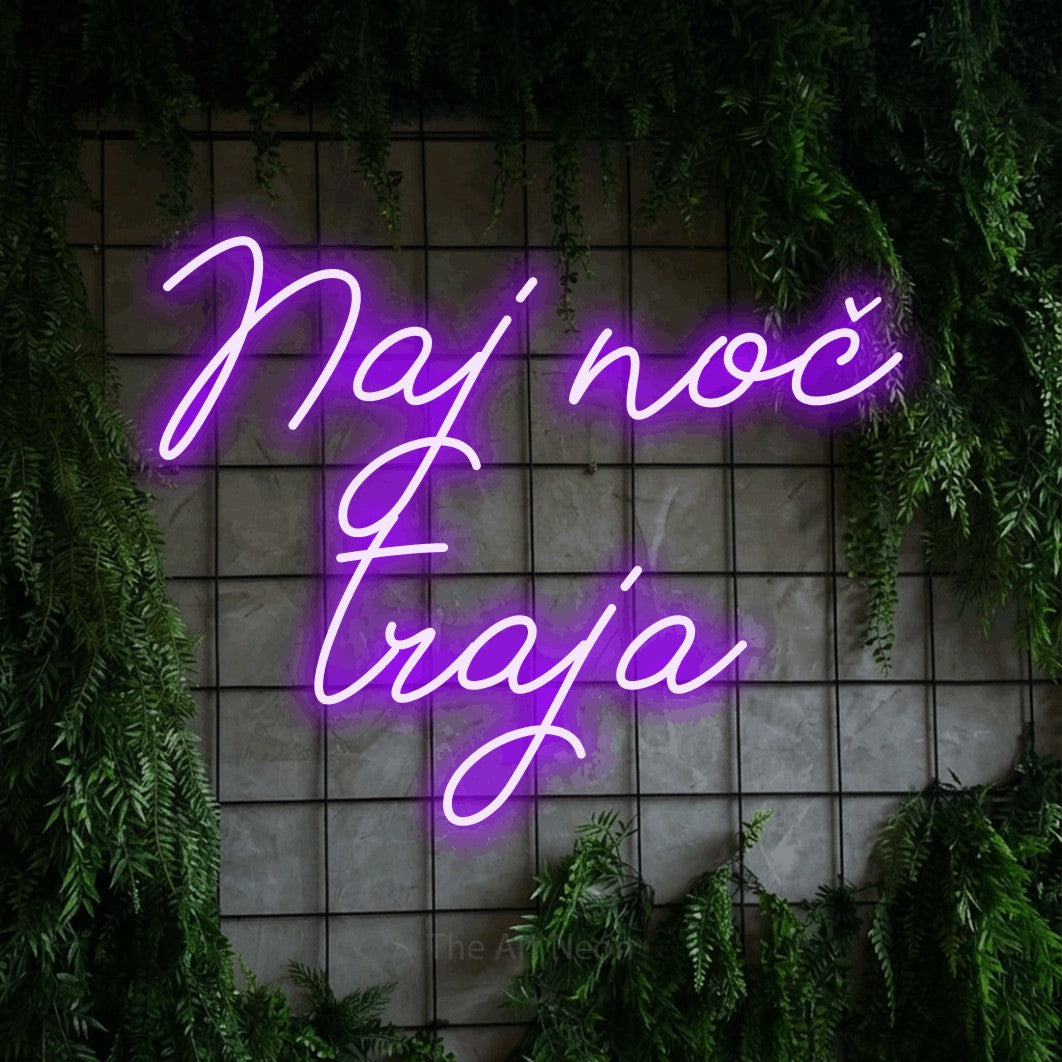 LED neon sign reading “Naj noč traja”, arranged in two lines.