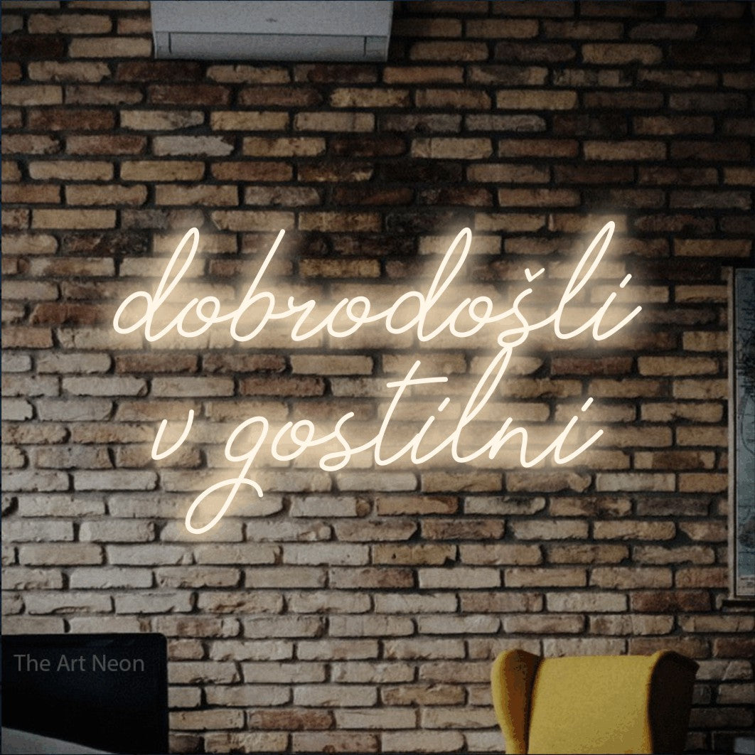 LED neon sign reading “dobrodošli v gostilni”, arranged in two lines.