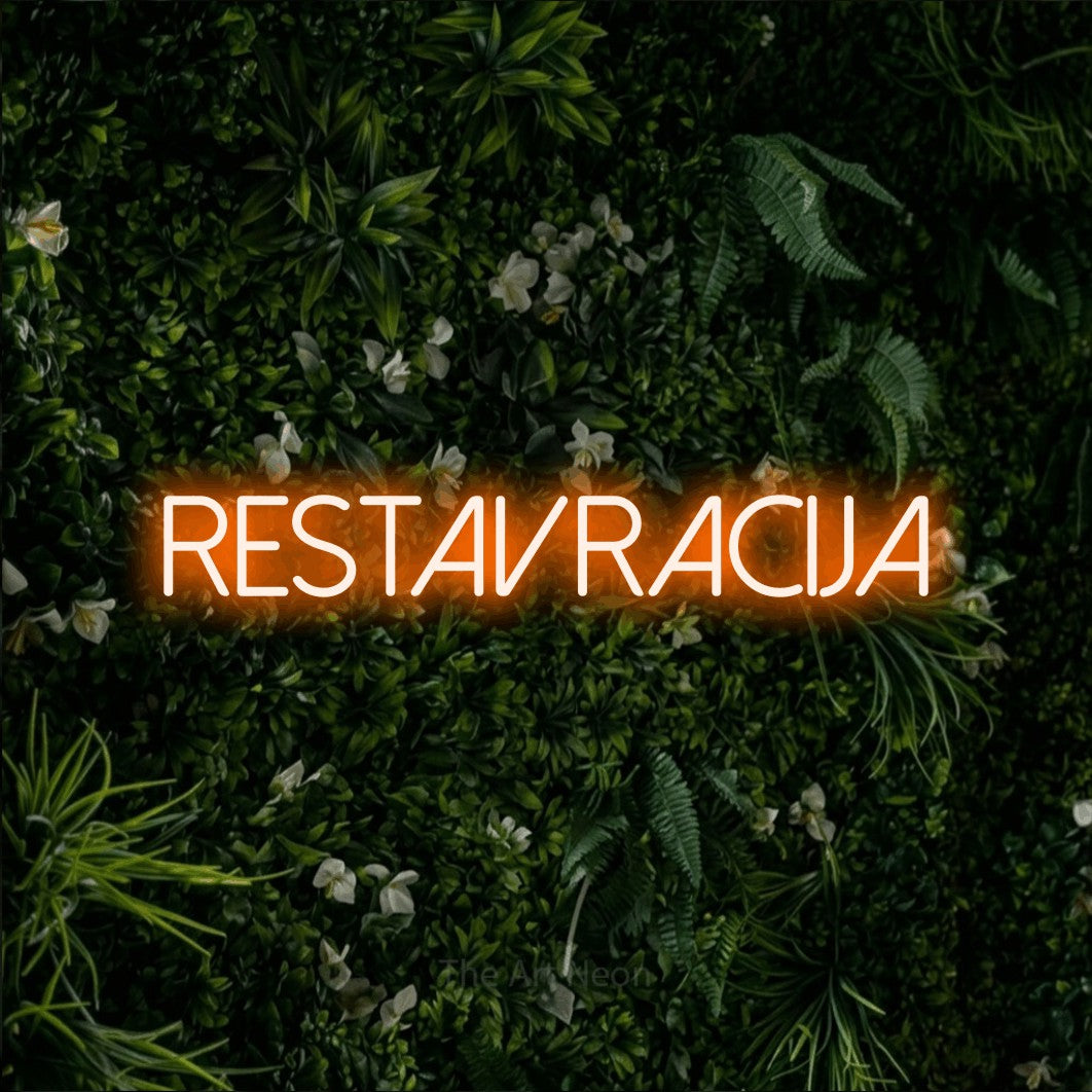 LED neon sign reading “restavracija”, arranged in a single line.