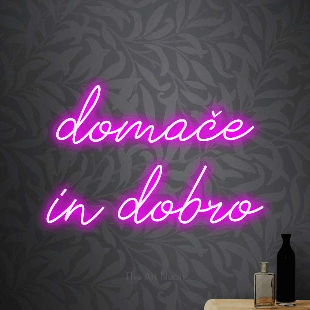 LED neon sign reading “domače in dobro”, arranged in two lines.