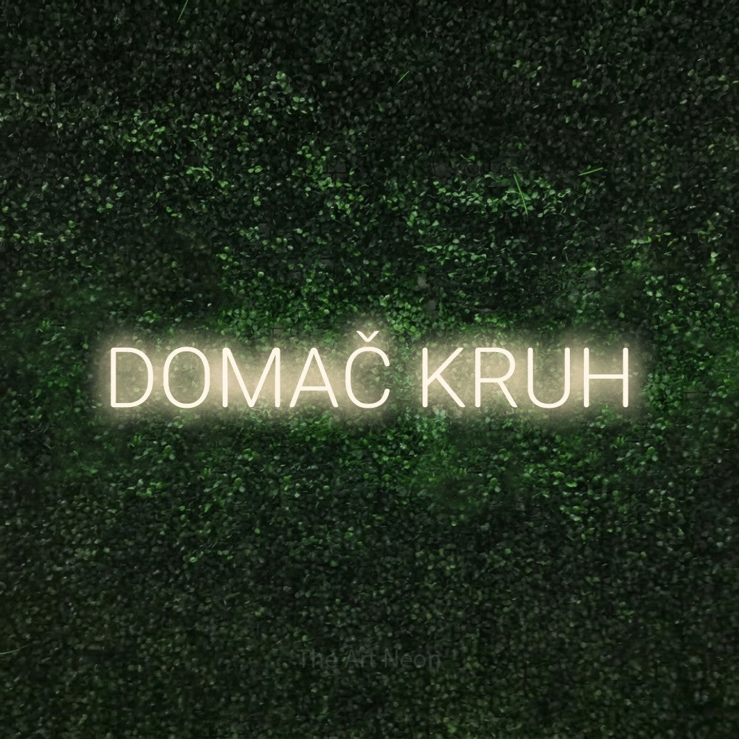 LED neon sign reading “DOMAČ KRUH”, arranged in a single line.