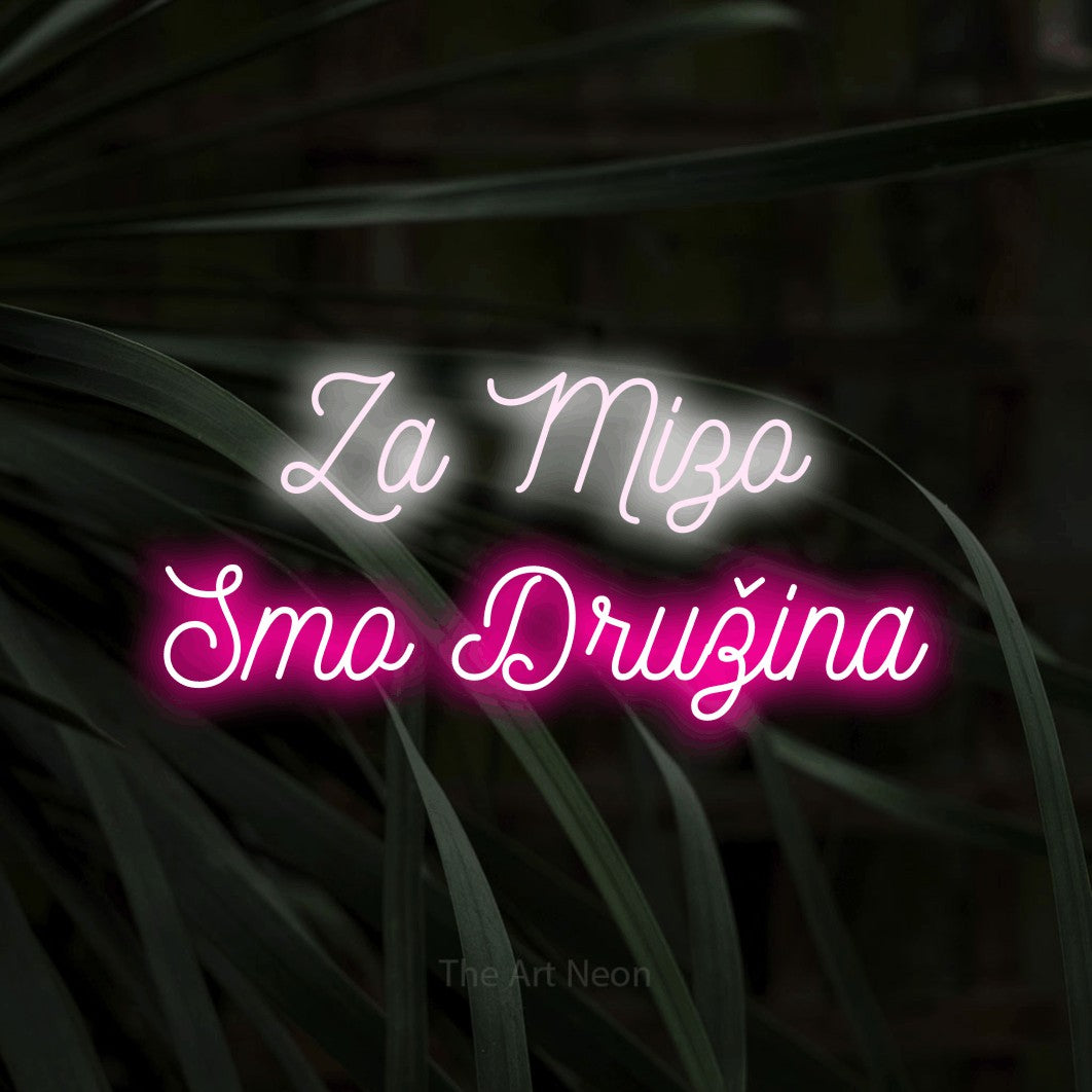 LED neon sign reading “Za Mizo Smo Družina”, arranged in two lines.