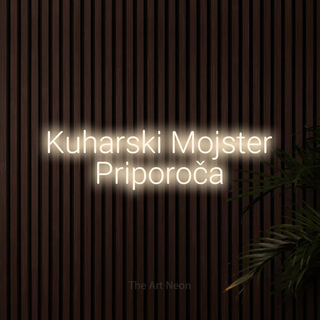 LED neon sign reading “Kuharski Mojster Priporoča”, arranged in two lines.