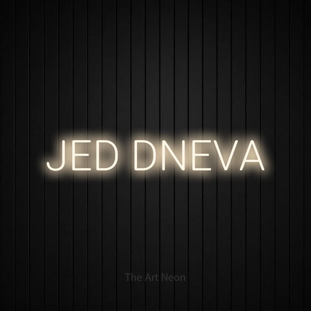 LED neon sign reading “JED DNEVA”, arranged in a single line.
