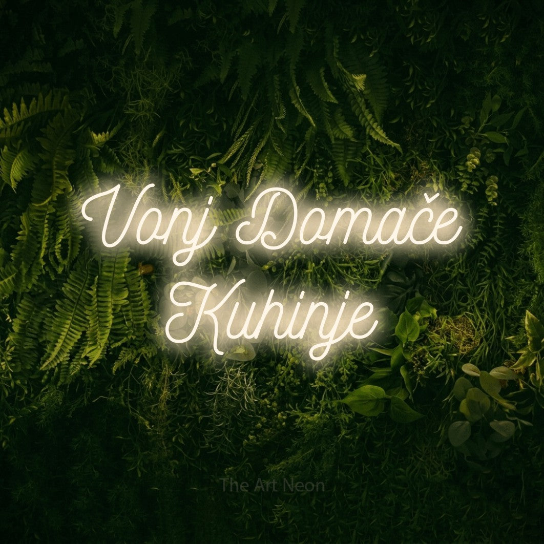 LED neon sign reading “Vonj Domače Kuhinje”, arranged in two lines.