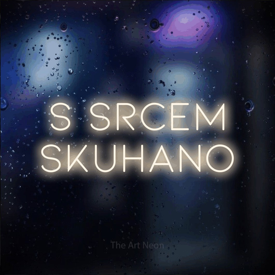 LED neon sign reading “S srcem skuhano”, arranged in two lines.