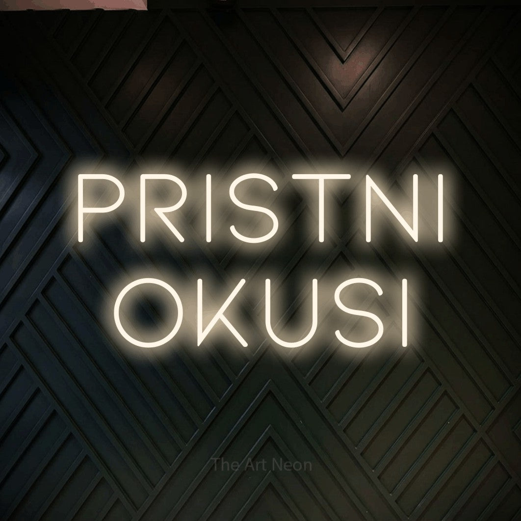 LED neon sign reading “Pristni Okusi”, arranged in two lines.