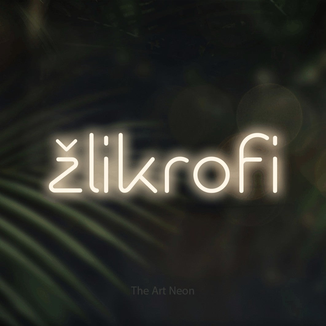 LED neon sign reading “žlikrofi”, arranged in a single line.
