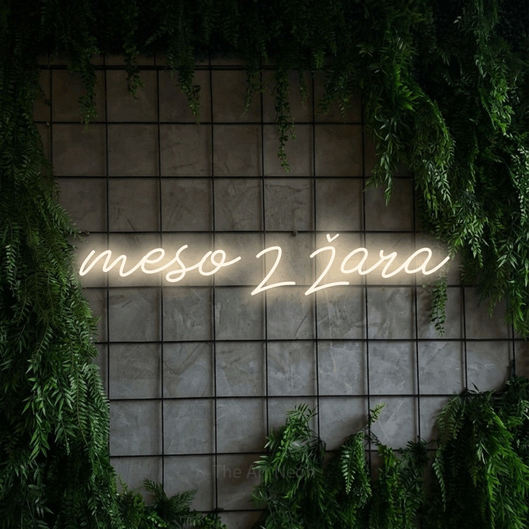 LED neon sign reading “meso z žara”, arranged in a single line.