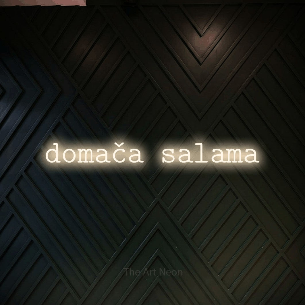 LED neon sign reading “domača salama”, arranged in a single line.