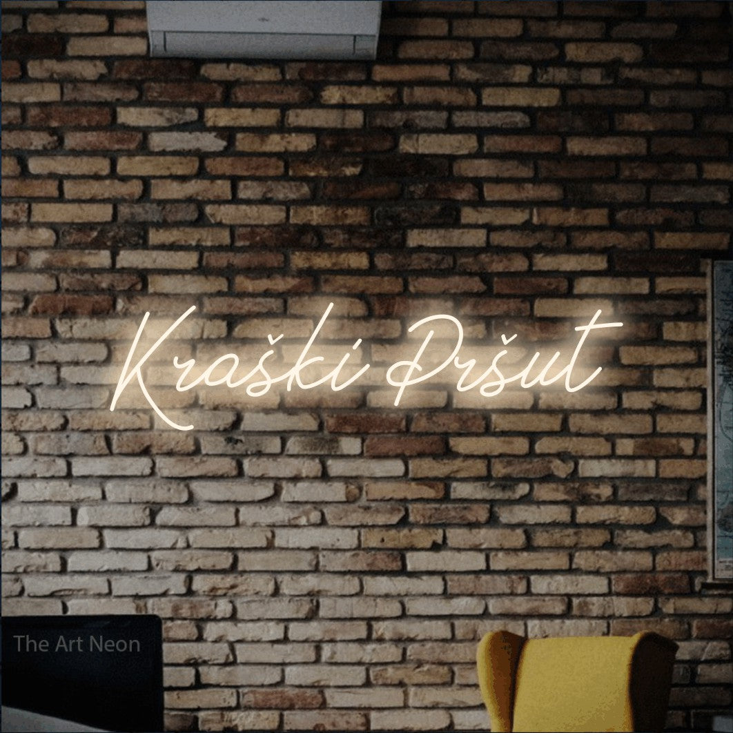 LED neon sign reading “Kraški Pršut”, arranged in a single line.