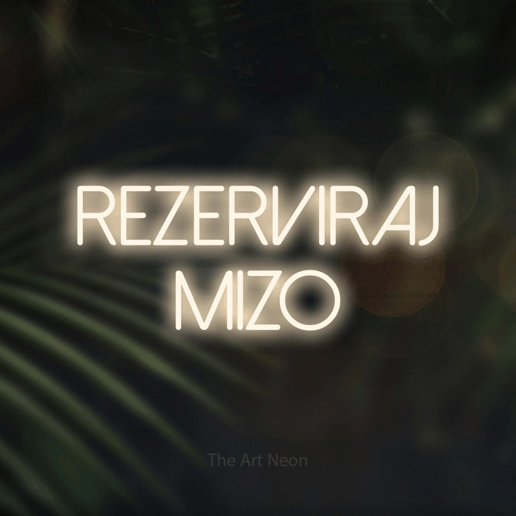LED neon sign reading “Rezerviraj Mizo”, arranged in two lines.