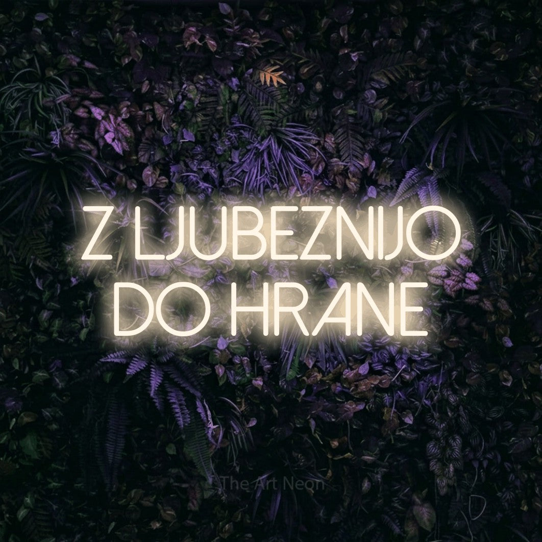 LED neon sign reading “Z LJUBEZNIJO DO HRANE”, arranged in two lines.