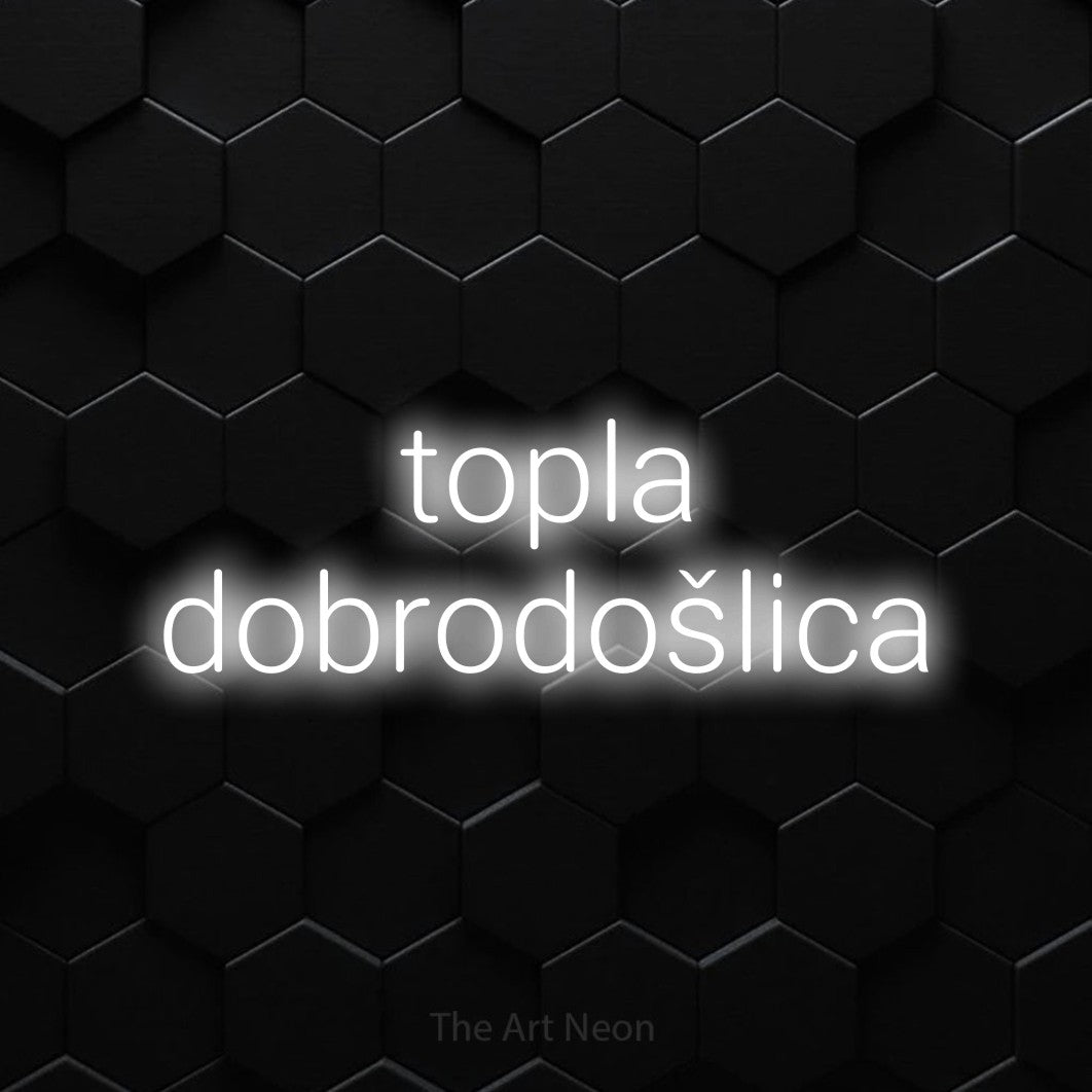 LED neon sign reading “topla dobrodošlica”, arranged in two lines.
