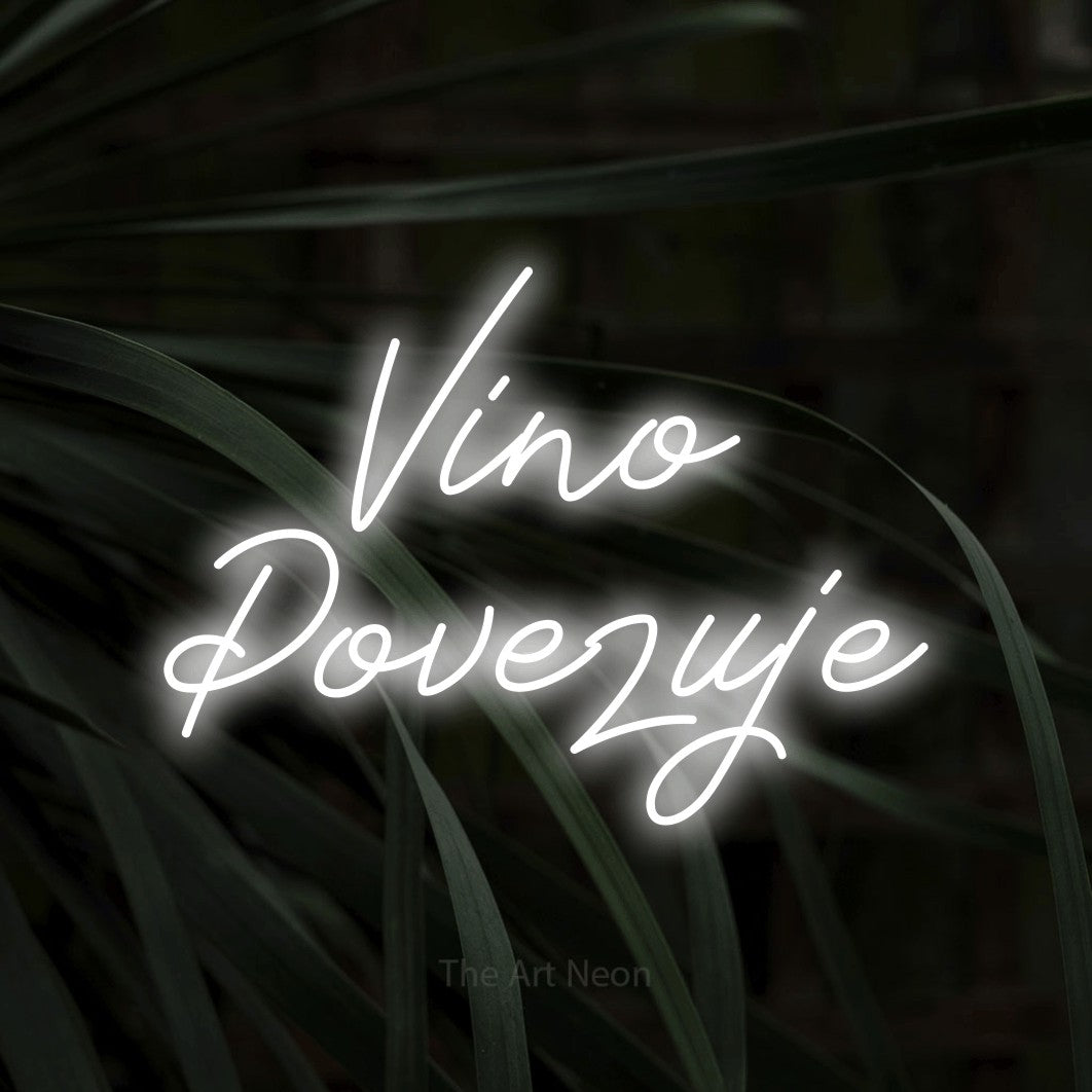 LED neon sign reading “Vino Povezuje”, arranged in two lines.