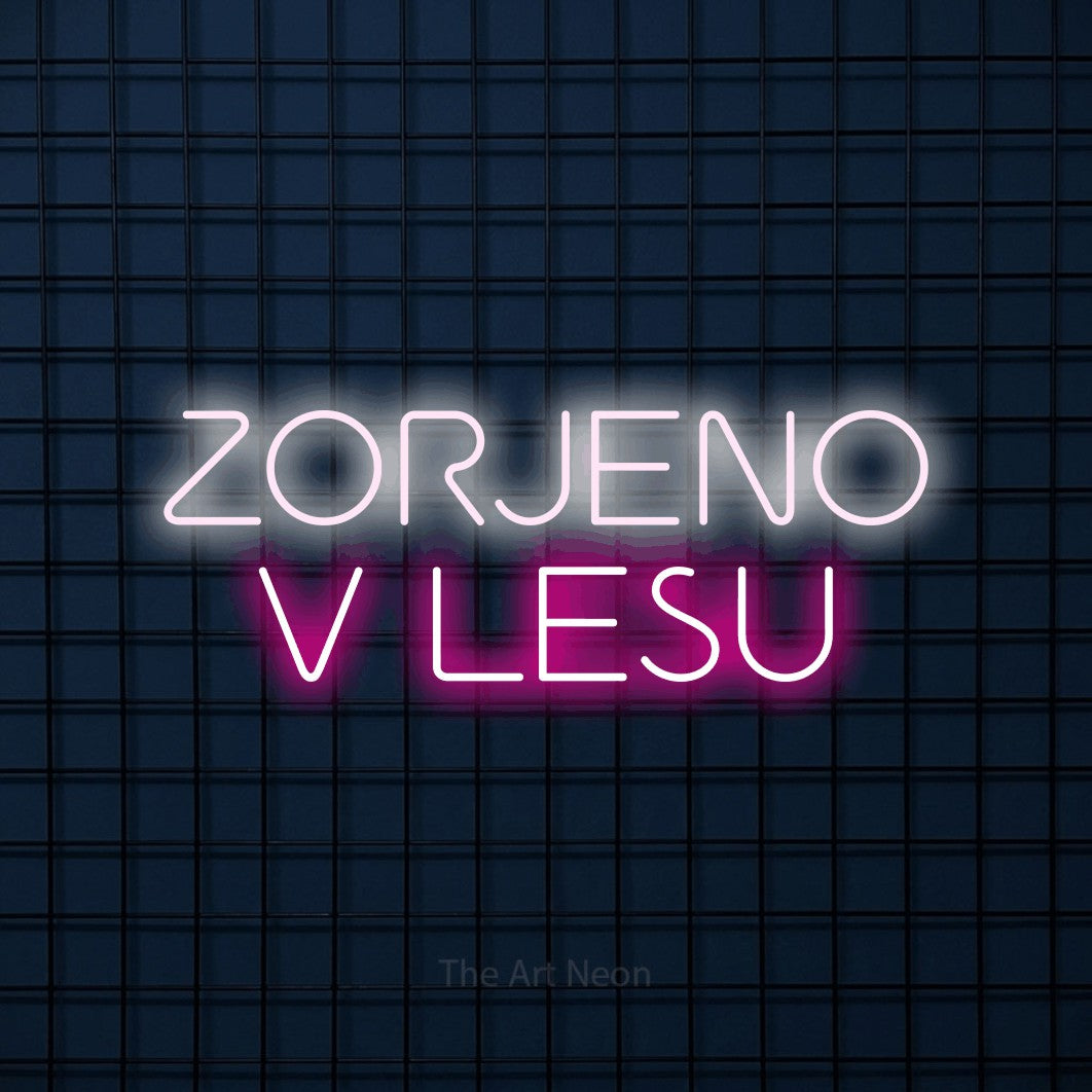 LED neon sign reading “ZORJENO V LESU”, arranged in two lines.