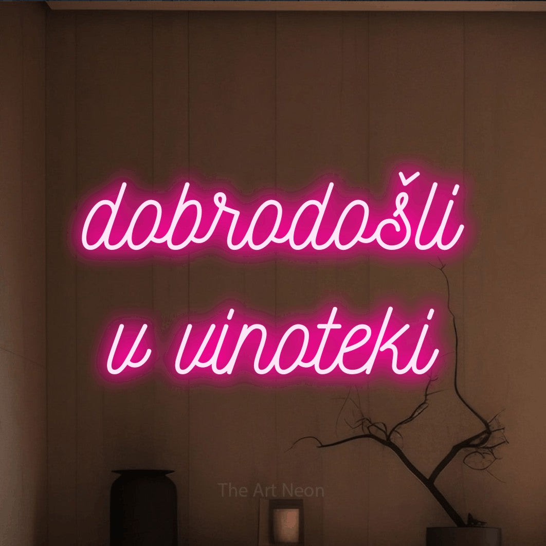 LED neon sign reading “dobrodošli v vinoteki”, arranged in two lines.