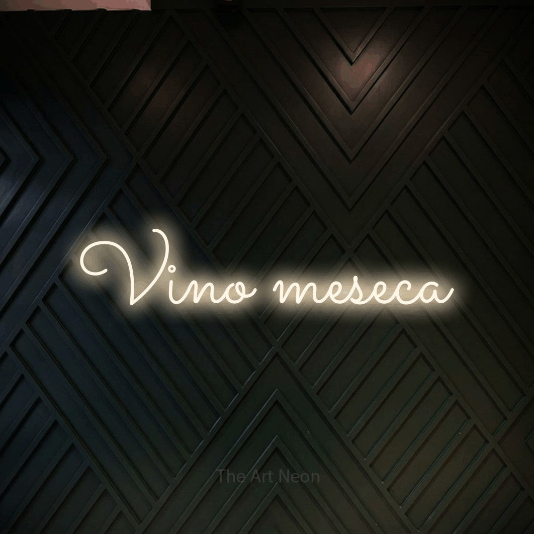 LED neon sign reading “Vino meseca”, arranged in a single line.