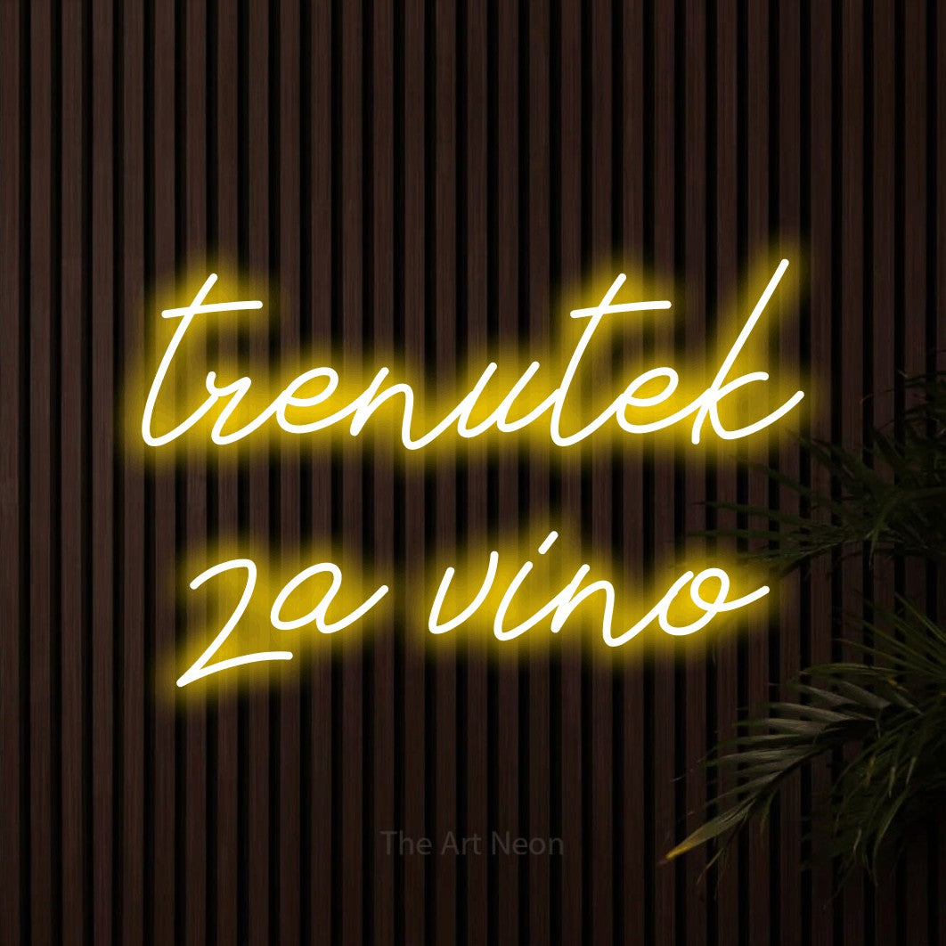 LED neon sign reading “trenutek za vino”, arranged in two lines.
