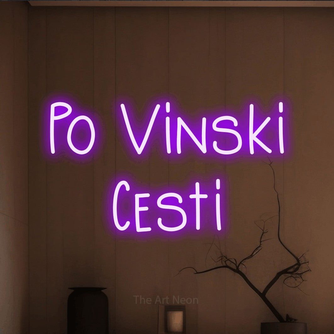 LED neon sign reading “Po Vinski Cesti”, arranged in two lines.