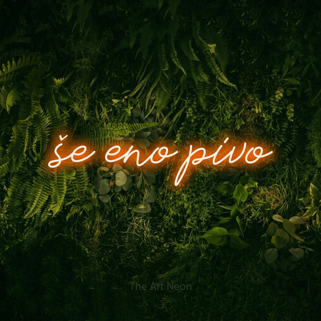 LED neon sign reading “še eno pivo”, arranged in a single line.