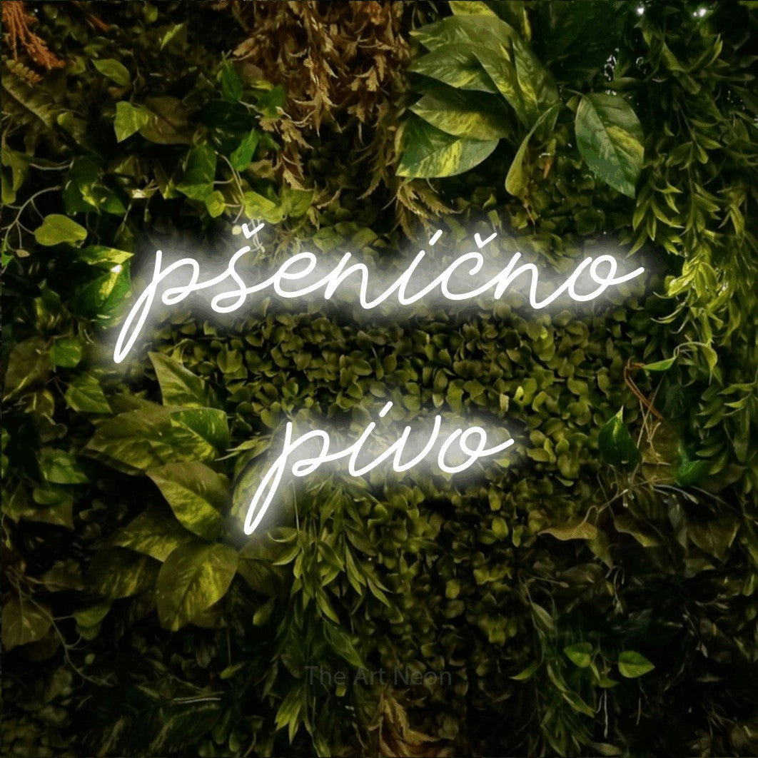 LED neon sign reading “pšenično pivo”, arranged in two lines.