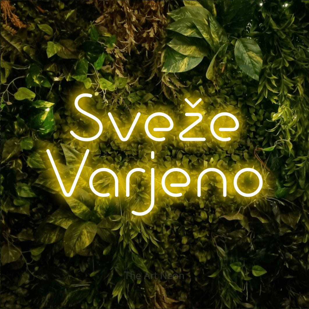LED neon sign reading “Sveže Varjeno”, arranged in two lines.