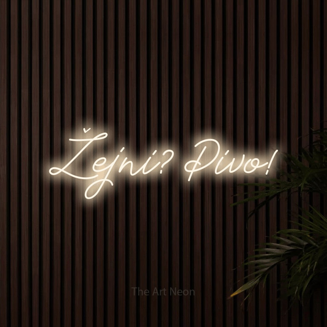 LED neon sign reading “Žejni? Pivo!”, arranged in a single line.