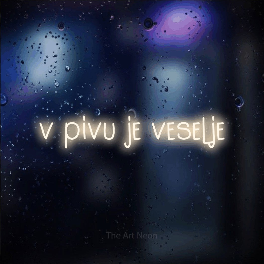 LED neon sign reading “v pivu je veselje”, arranged in a single line.