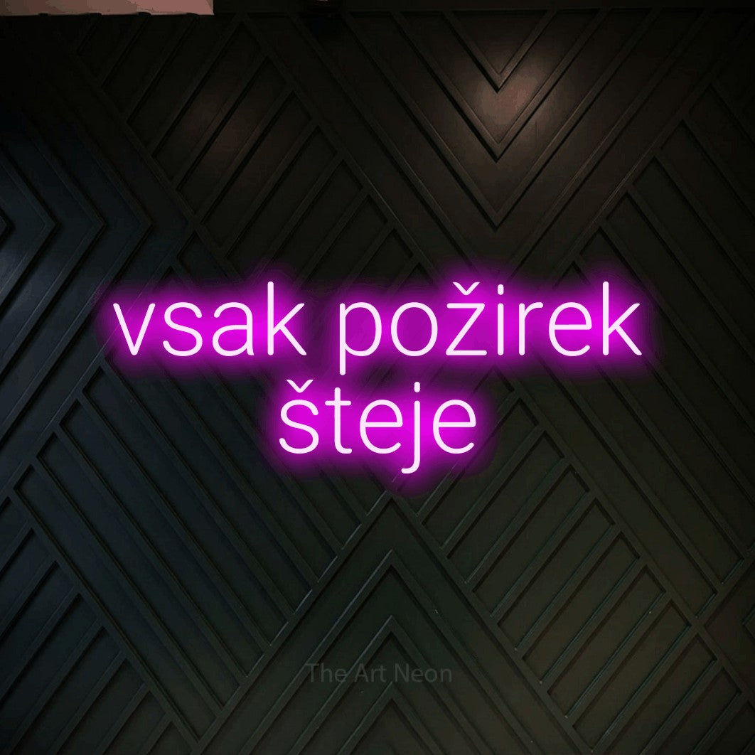 LED neon sign reading “vsak požirek šteje”, arranged in two lines.