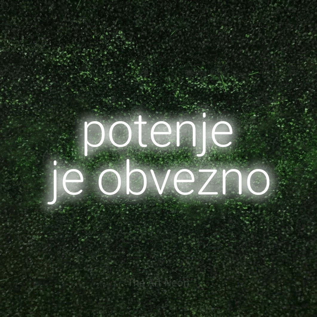 LED neon sign reading “potenje je obvezno”, arranged in two lines.
