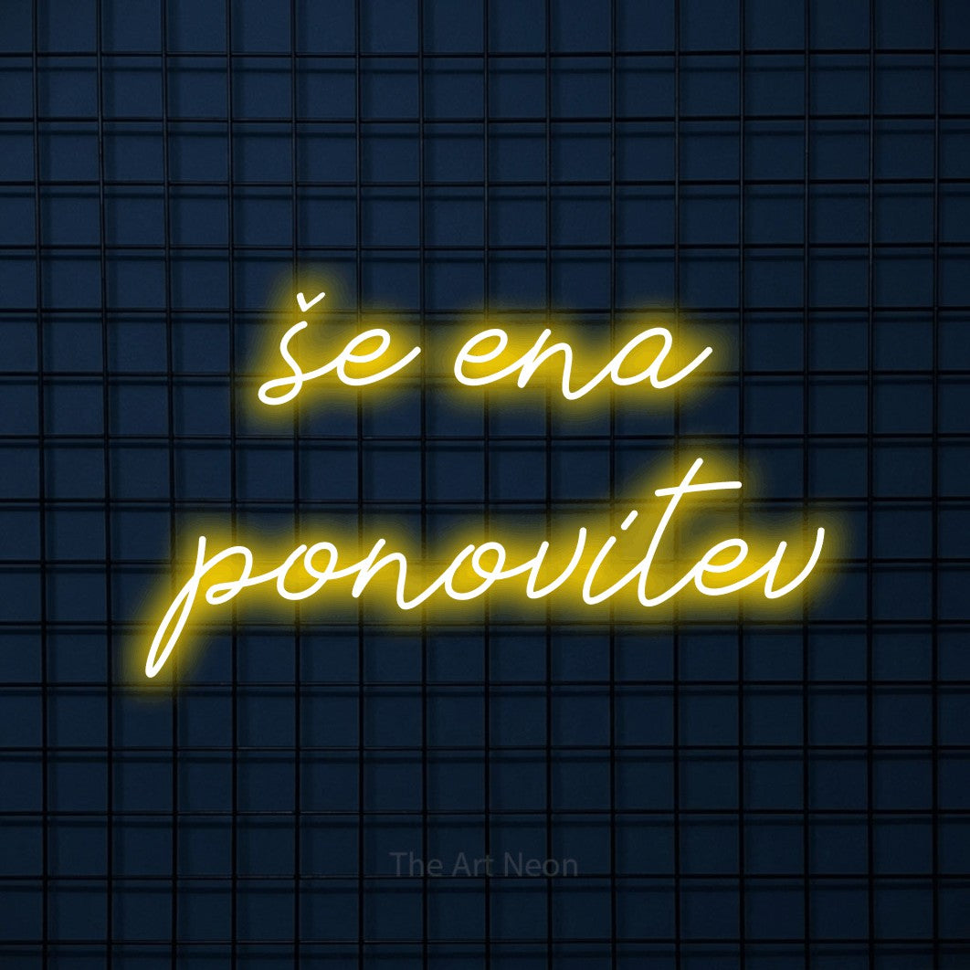 LED neon sign reading “še ena ponovitev”, arranged in two lines.