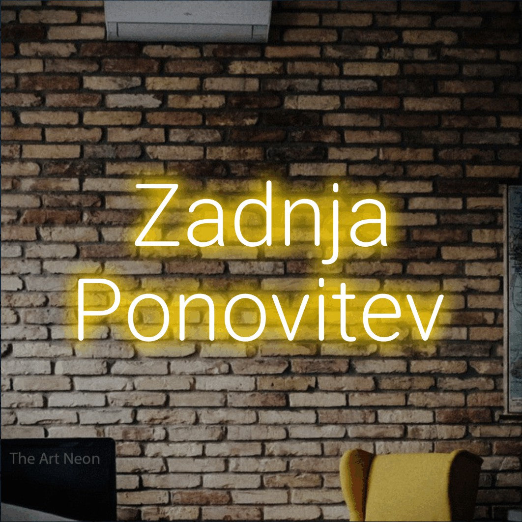 LED neon sign reading “Zadnja Ponovitev”, arranged in two lines.