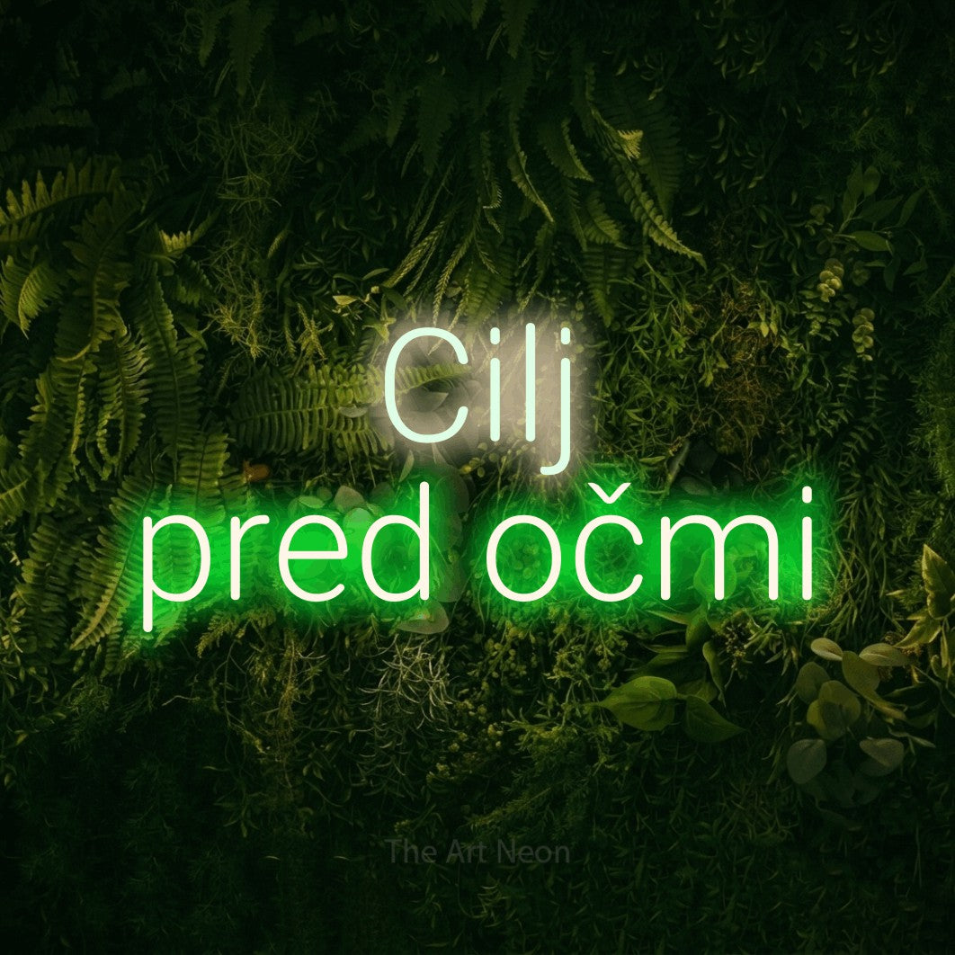 LED neon sign reading “Cilj pred očmi”, arranged in two lines.