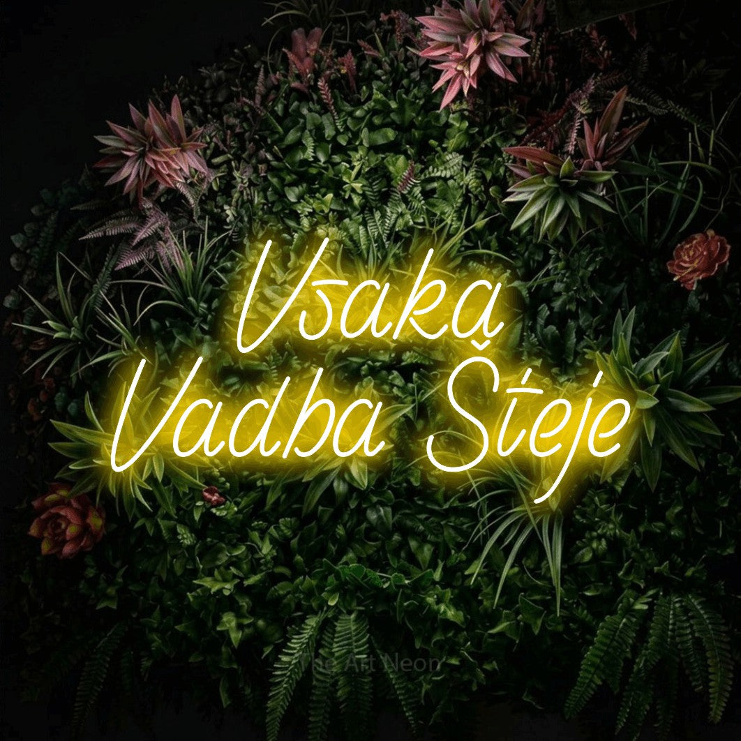 LED neon sign reading “Vsaka Vadba Šteje”, arranged in two lines.